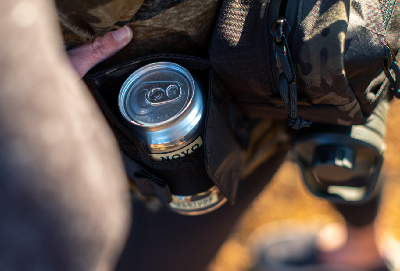 Collapsible bottle or can pocket